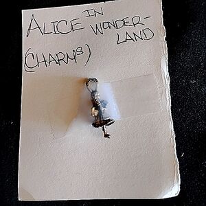 Charming Silver Figurine Pendant